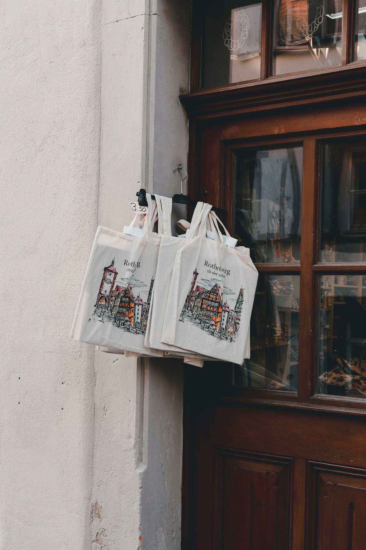 a couple of bags hanging from the side of a building
